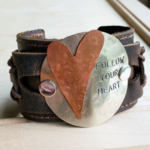 FOLLOW YOUR HEART DISTRESSED LEATHER CUFF